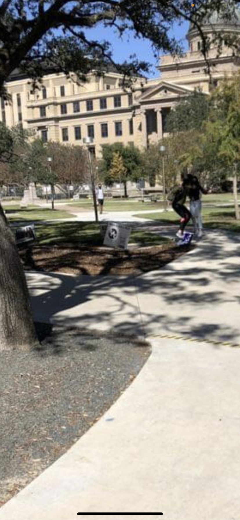 A photo where another student is allegedly destroying a Trump campaign sign