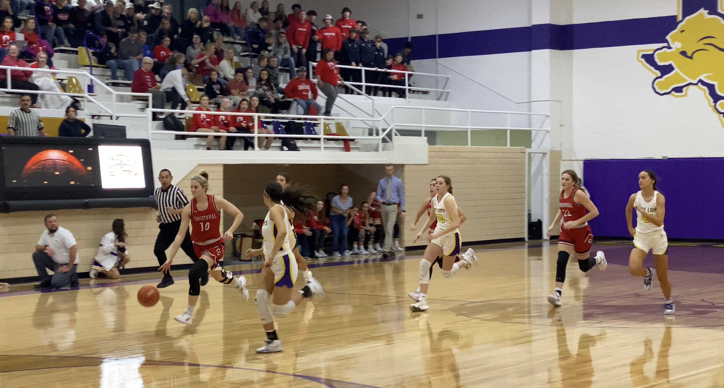 Christoval's Halle Hughes drives toward the basket in the first quarter.