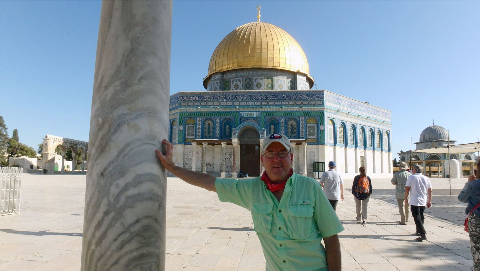 The author, Kendal Hemphill, posing for a photo in front of the Dome of the Rock Temple in Jeruseulum.