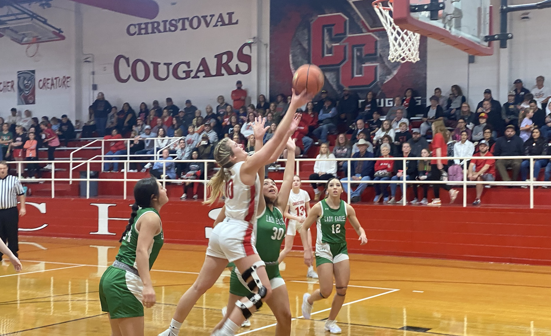 Christoval Lady Cougar Halley Hughes Goes up for a shot against the Eldorado Lady Eagles