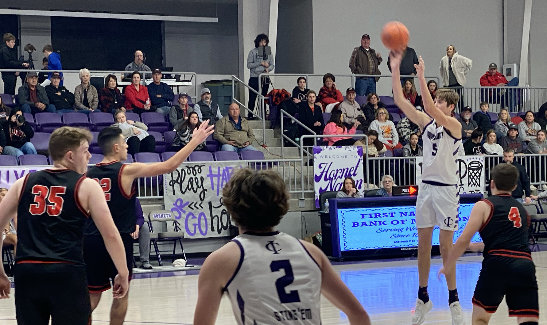 Irion County's Tyler Henderson sinks a three against Garden City