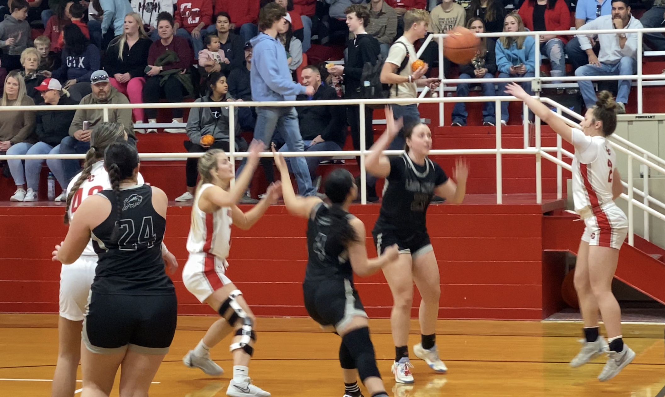 Madyson George and Halle Hughes play Keep Away from Forsan's Lilly Hoff.