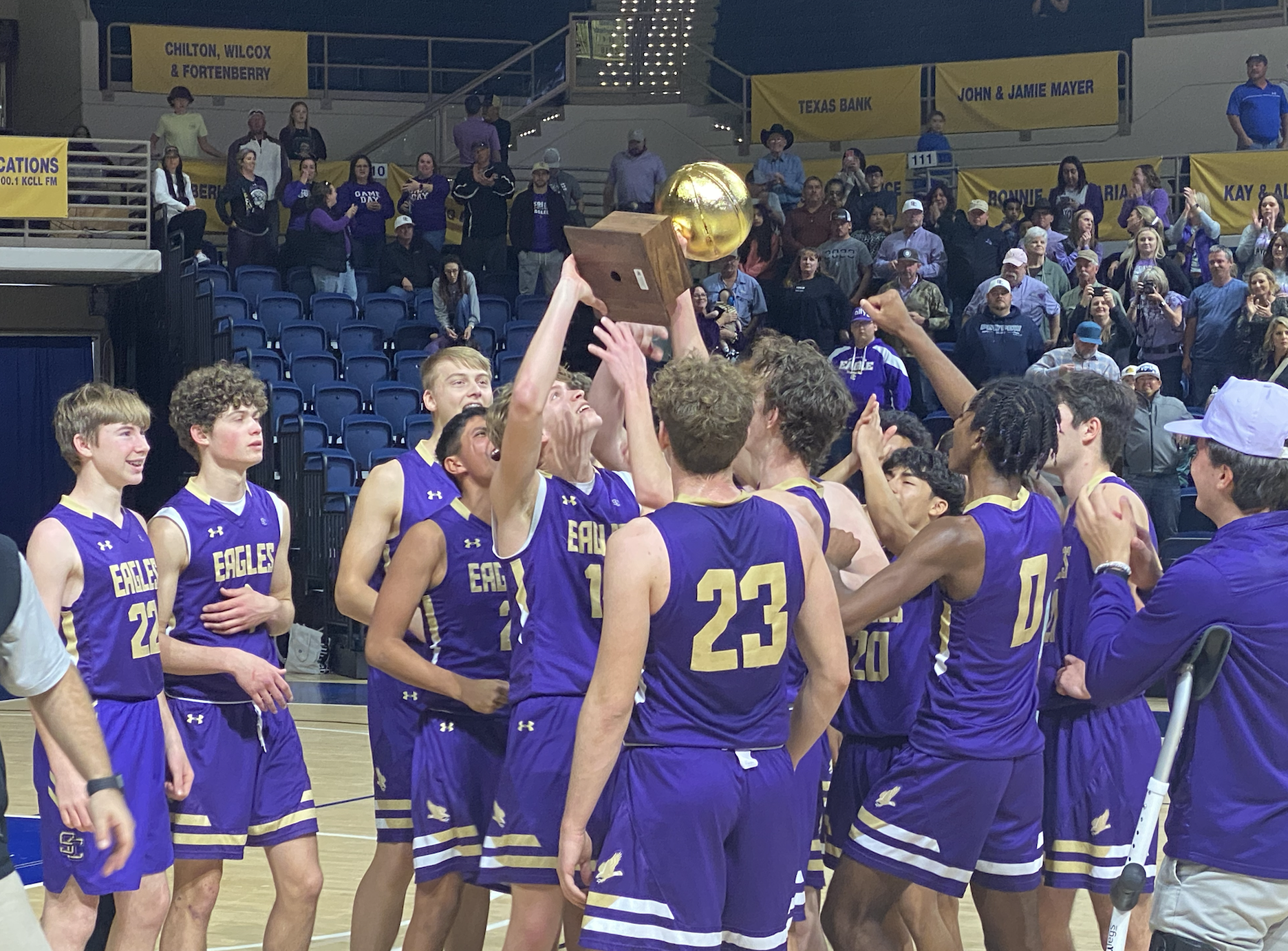 The Sterling City Eagles lift the gold ball after beating Miles, 48-38.