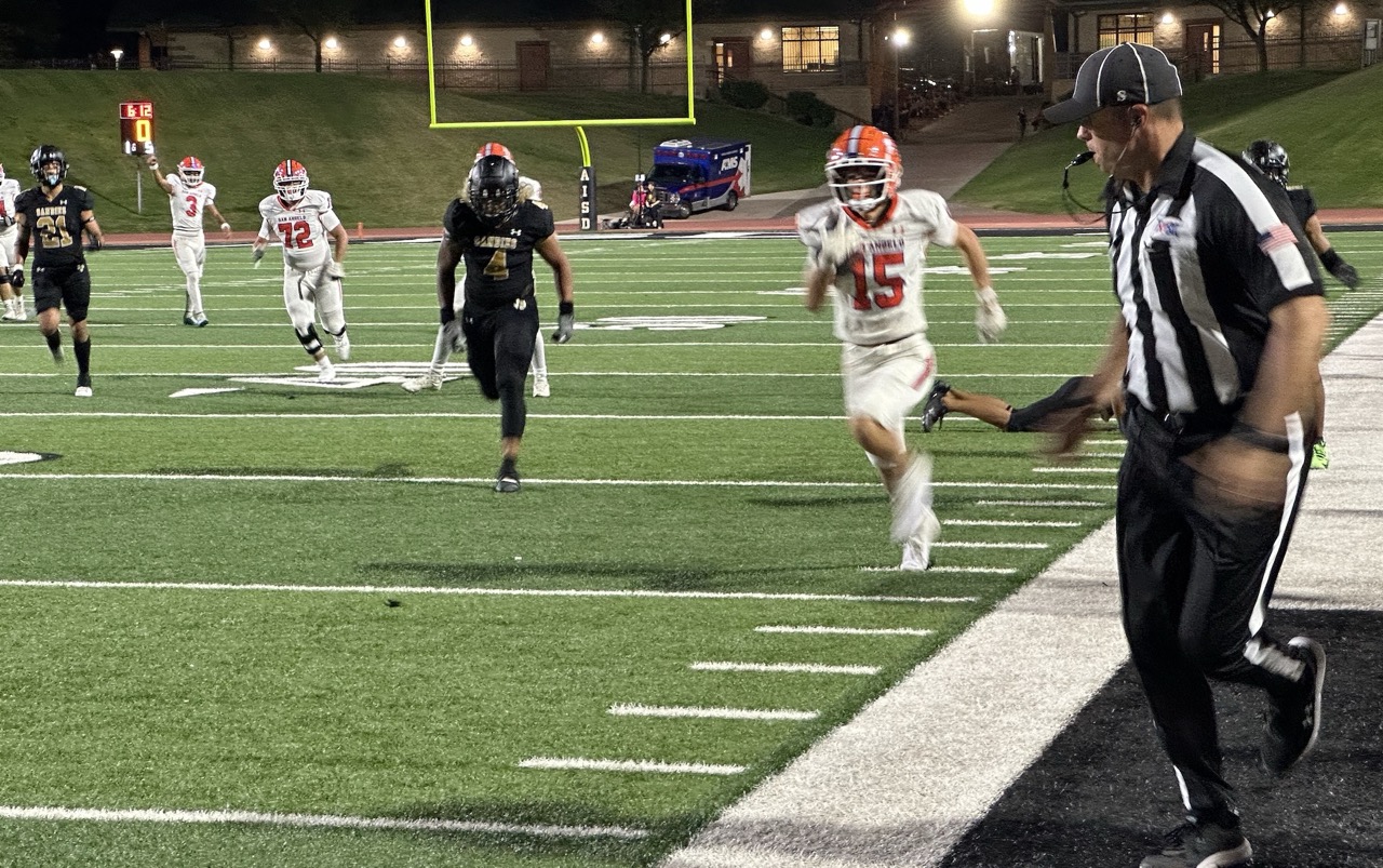Central Bobcats' Gavin Johnson on a long touchdown run down the sideline against Amarillo High