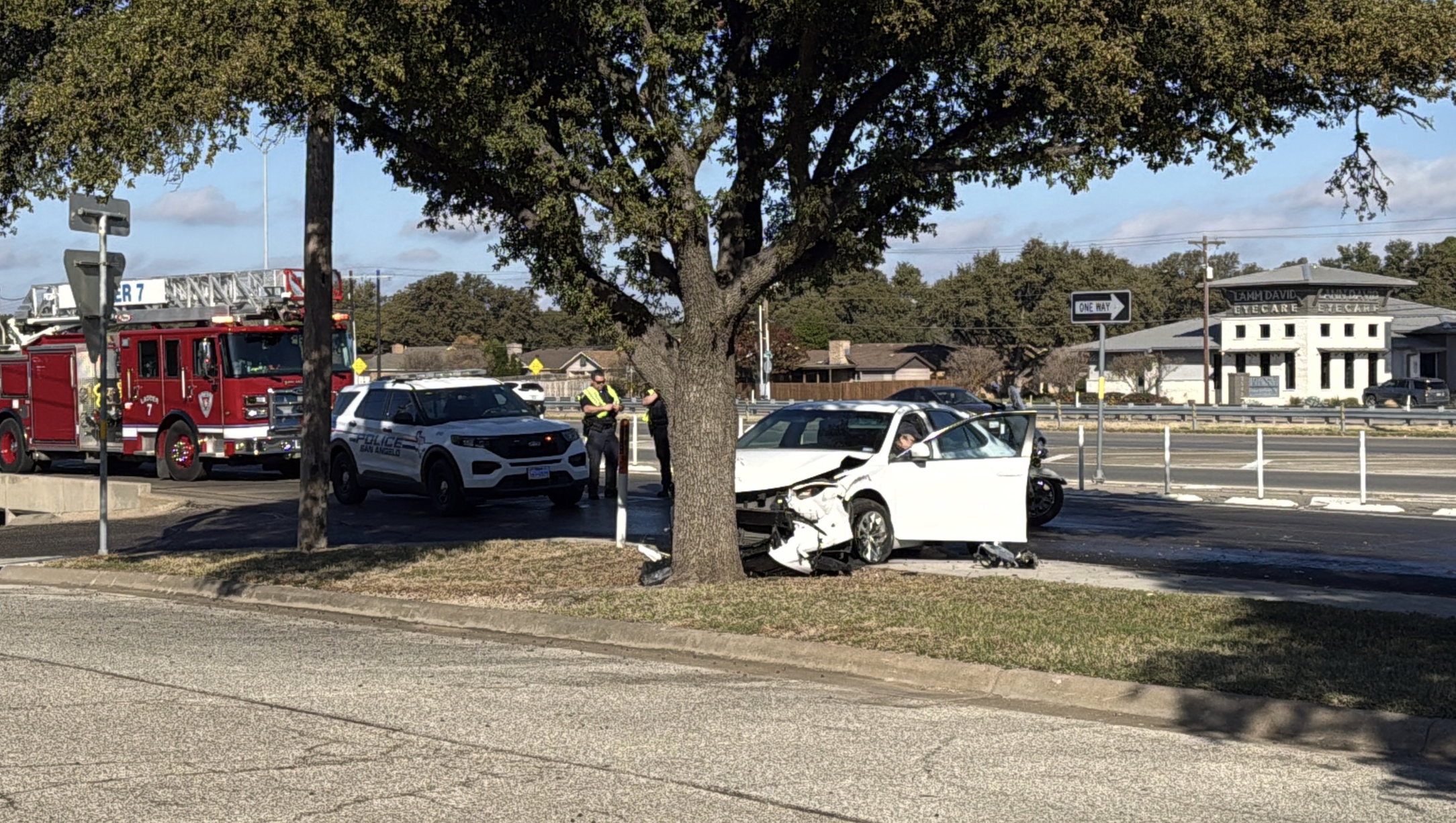White Toyota Camry strikes a tree in crash