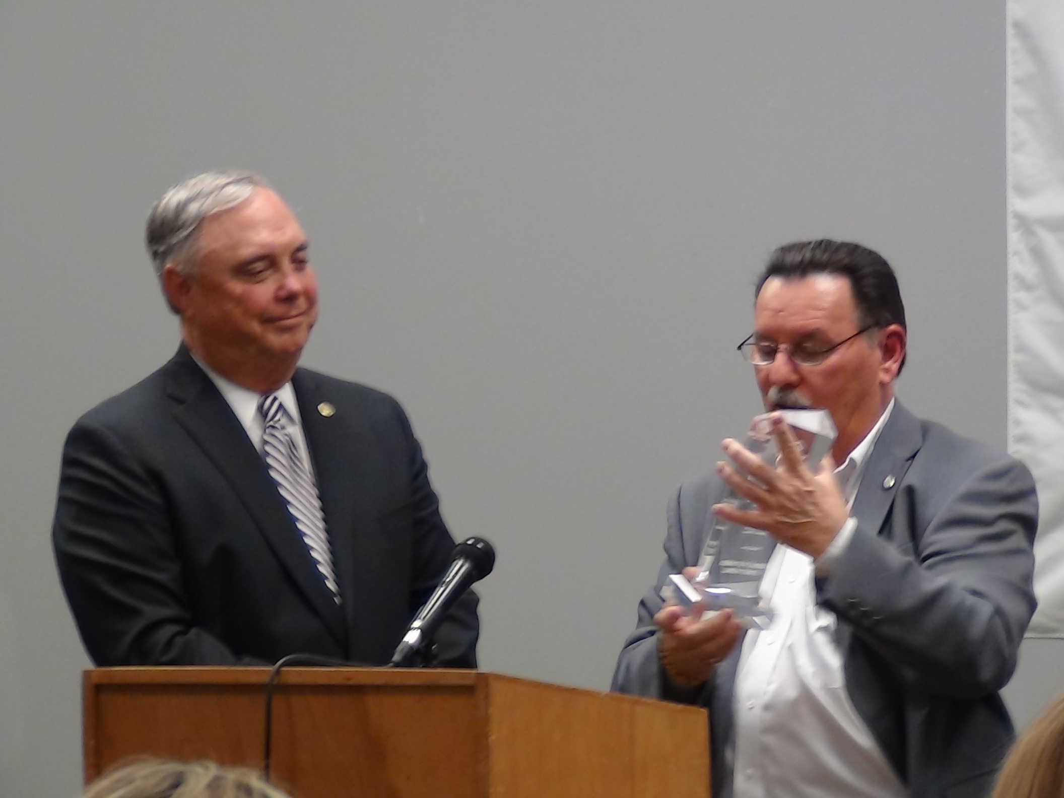 Harry Thomas presents Drew Darby with an Award for Outstanding Service (LIVE! photo by Cheyenne Benson)