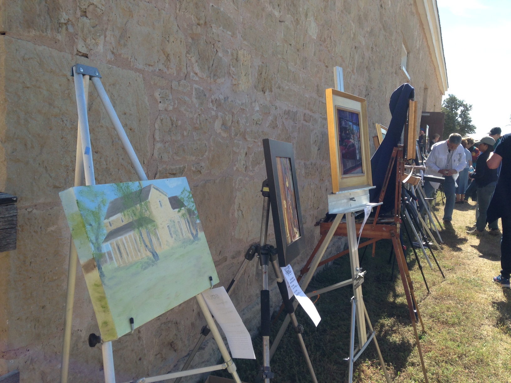 Easels line the Quartermaster building at Fort Concho after Saturday's Paint Out. (LIVE! Photo/Chelsea Reinhard)