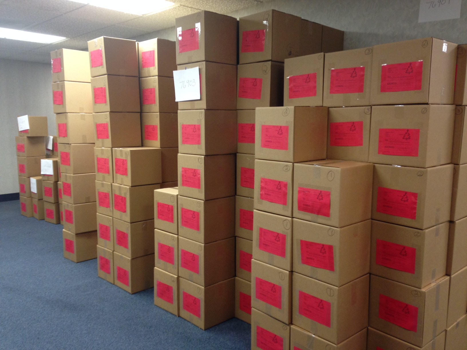 Boxes of gifts for inmates' children fill a room at the Sheriff's Office. (LIVE! Photo/Chelsea Reinhard)