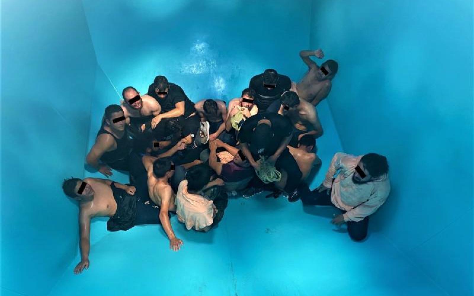 Illegal Aliens in a Rail Car Grain Hopper (Contributed/CBP)