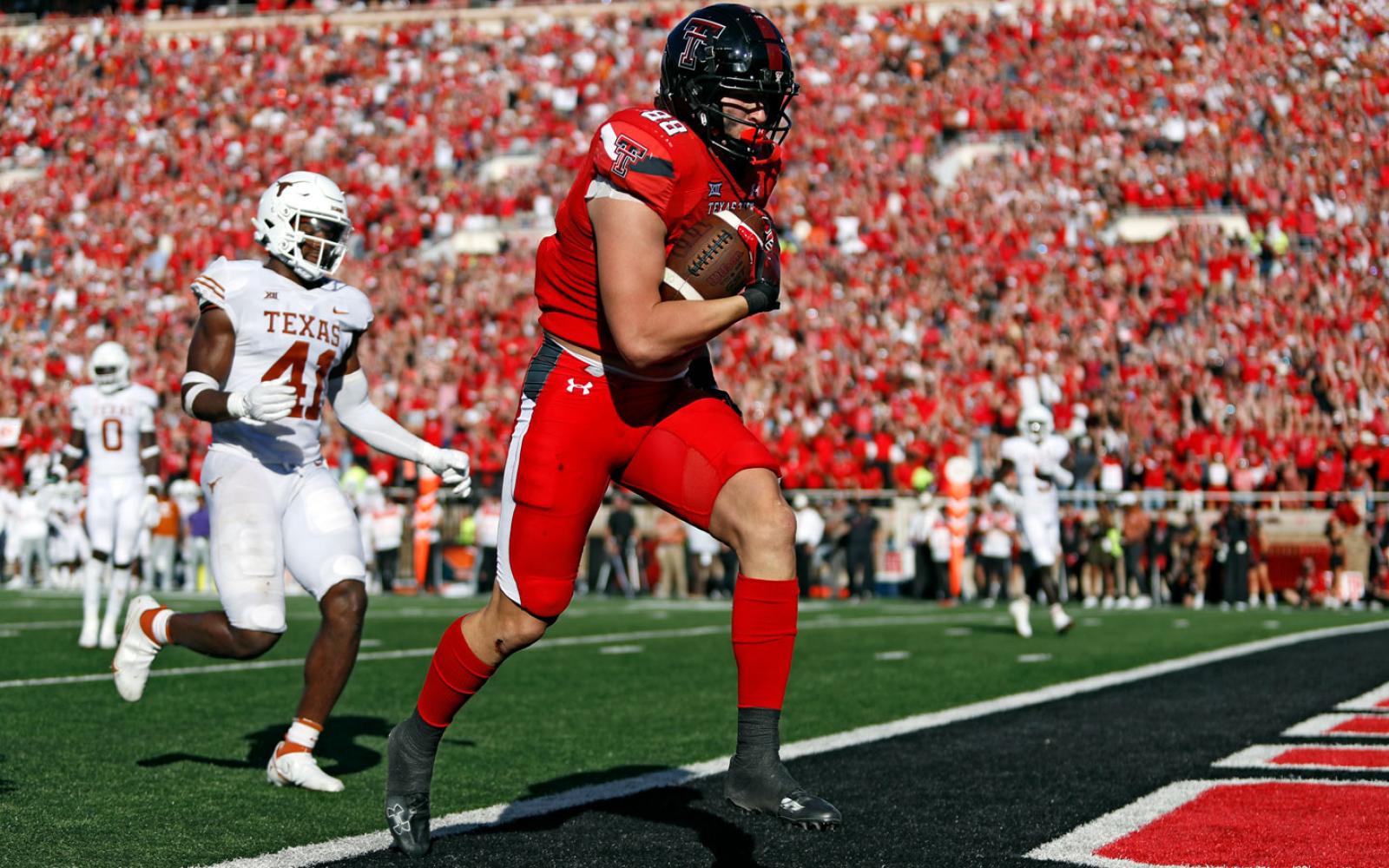 Texas Tech's Baylor Cupp (88) scores a touchdown during the second half of an NCAA college football game against Texas, Saturday, Sept. 24, 2022, in Lubbock, Texas. (AP Photo/Brad Tollefson)