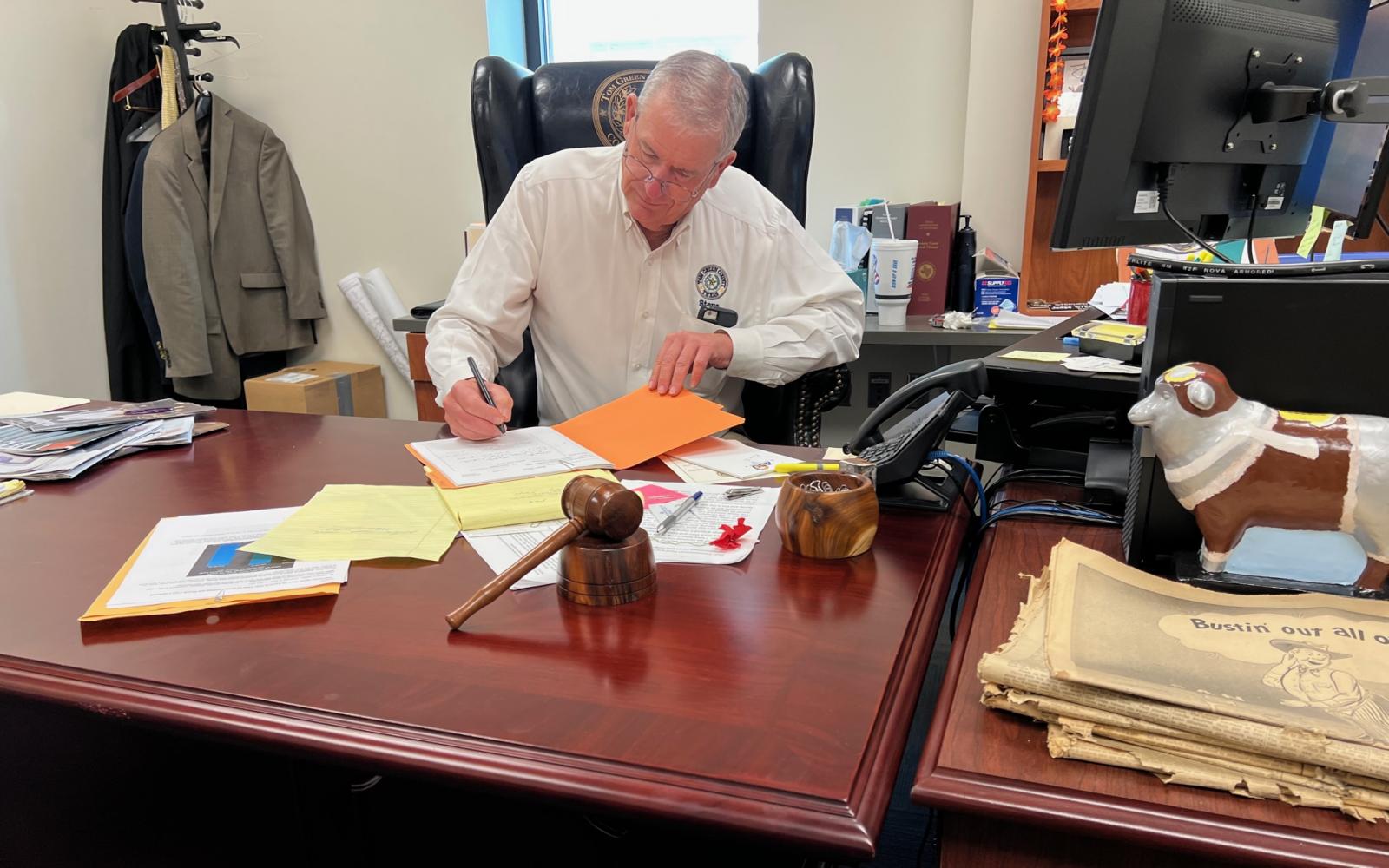 Tom Green County Judge Steve Floyd at His Desk 12.22 (LIVE! Photo/Yantis Green)