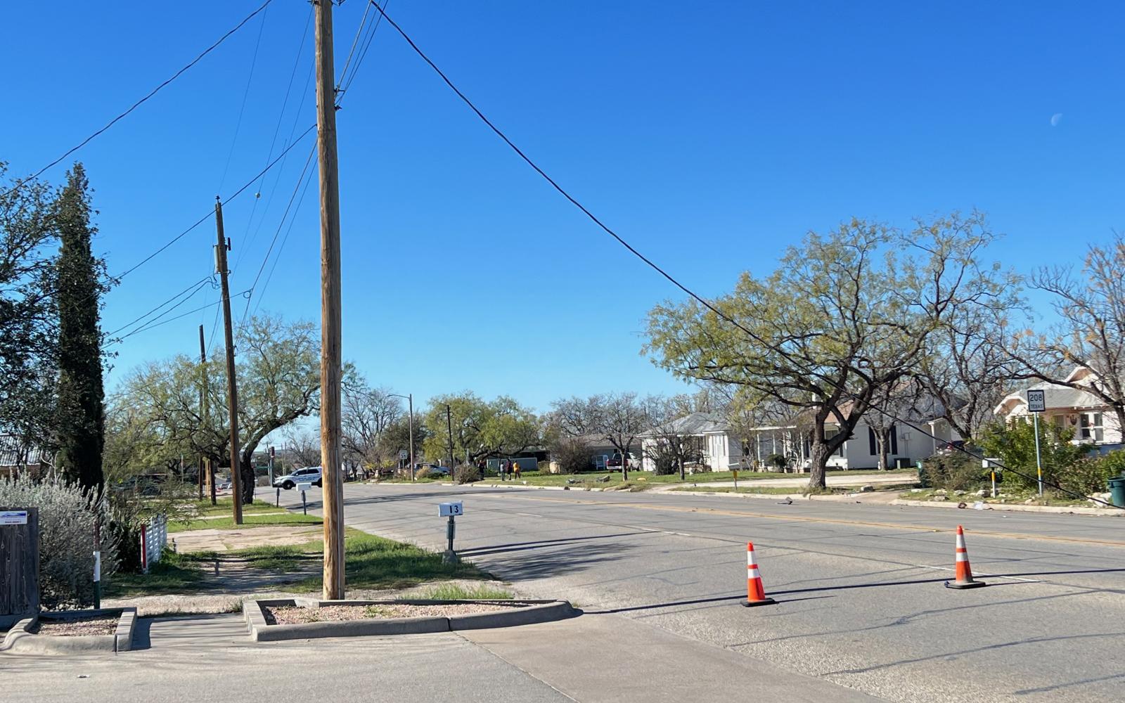 A single vehicle crash near the intersection of N. Irving St. and W. 19th St. has taken out two telephone poles on Dec. 15, 2022.
