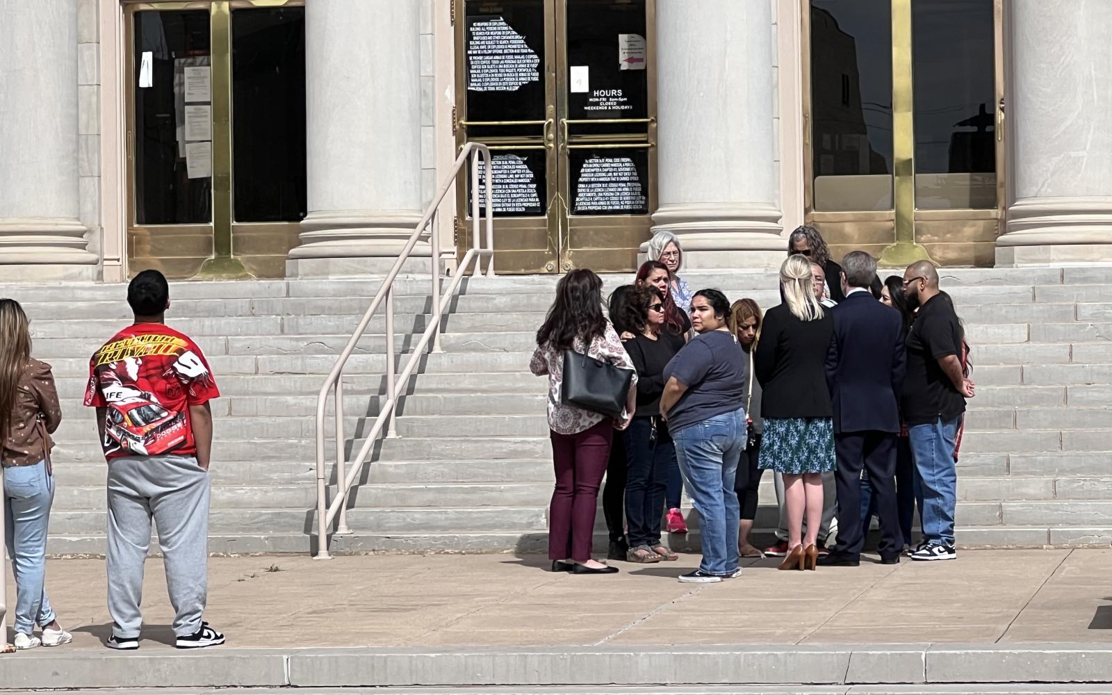 DA John Best Speaking with Family Following the Not Guilty Verdict