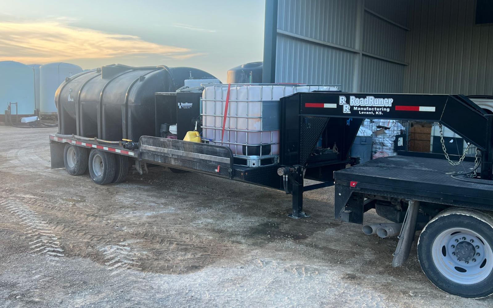 A 32-foot gooseneck trailer holding a 3,000-gallon water tank with a pumping system connected to it was still missing Wednesday night, May 10, 2023. There were two white totes full of herbicide on the front end of the trailer.