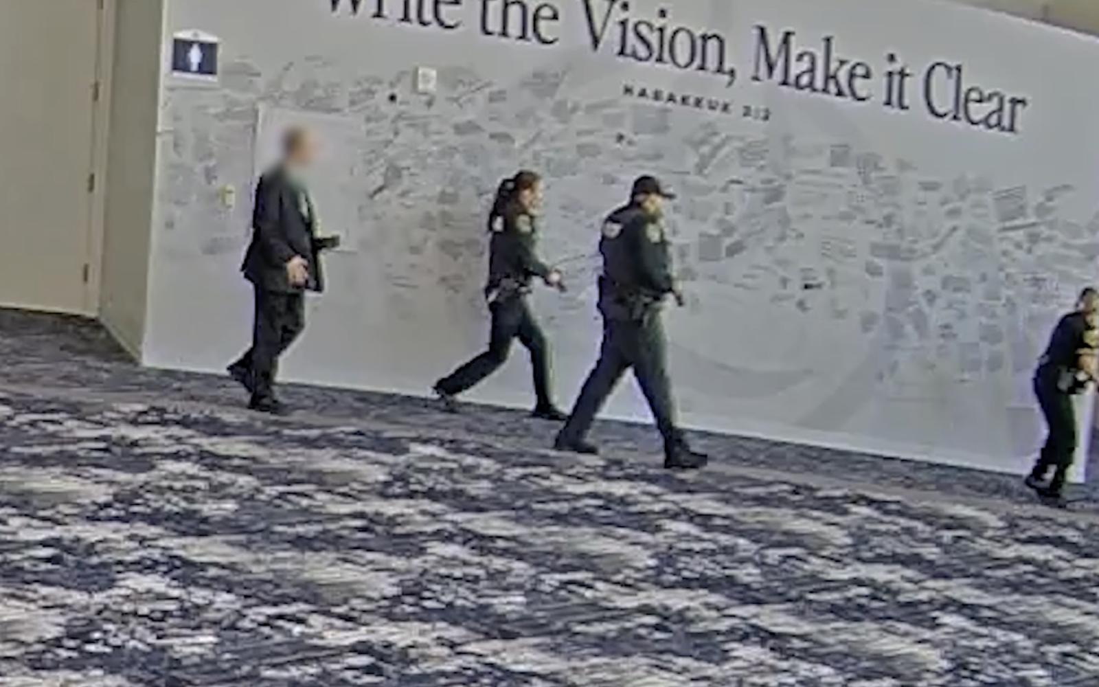 Screen Shot of Police Pursuing Shooter from YouTube Video Body Cam Footage