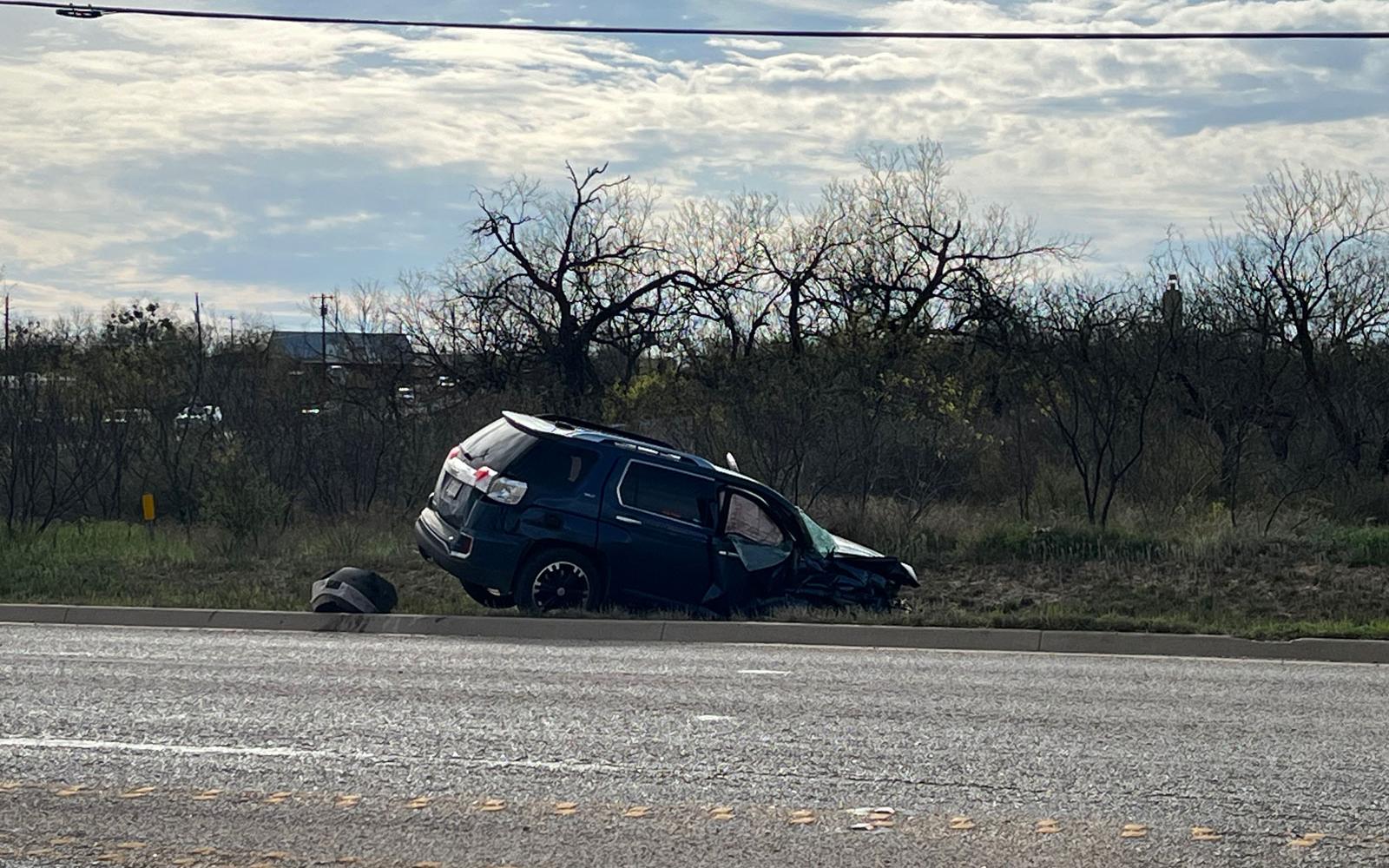 This is the second vehicle involved in the crash. At 5:30 p.m. an ambulance with this blue GMC SUV's occupants rushed away from the scene with lights and sirens blaring.