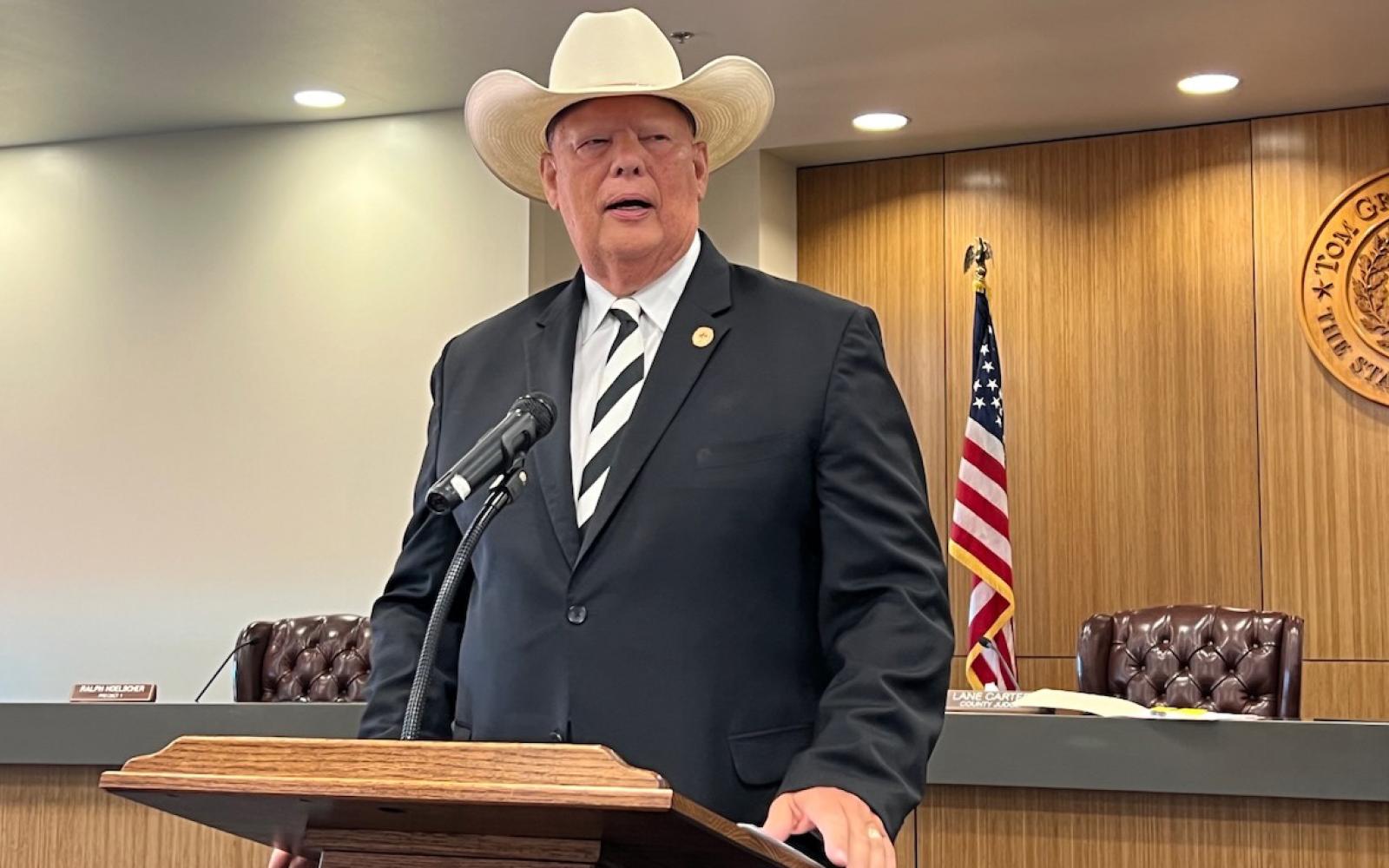 Retired Texas Ranger David Maxwell addresses the large crowd celebrating the swearing-in of four new deputies on June 24, 2024.