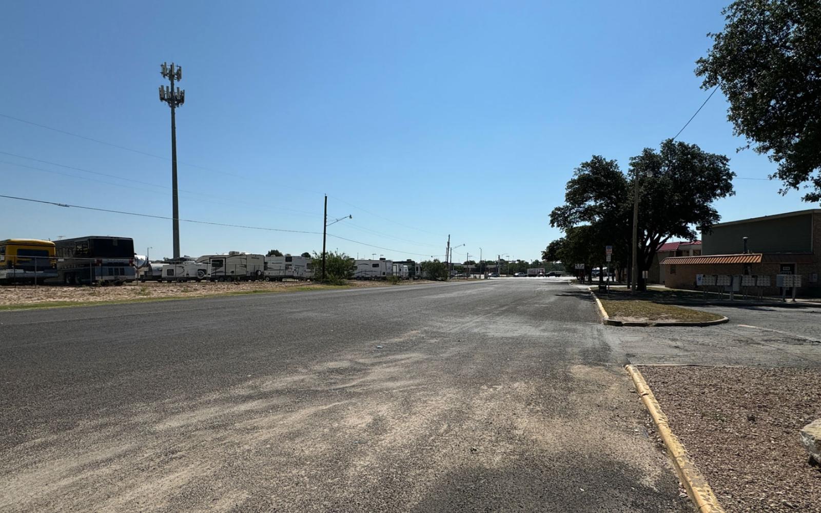 Looking down Ben Ficklin eastward towards S. Bryant. On crowded nights at City Limits, both sides of the street can be full of cars of patrons.
