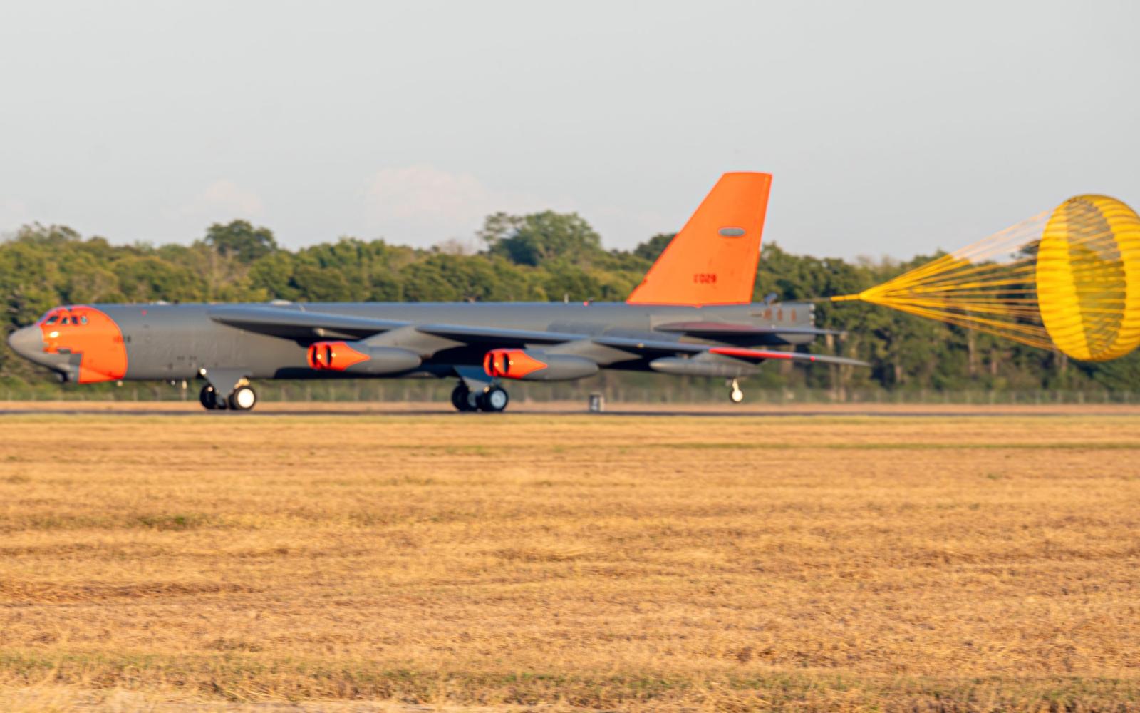 B-52H Stratofortress with a special orange paint scheme as it begins to slow down after landing at Barksdale Air Force Base, La., Sept. 30, 2024. (U.S. Air Force photo by Airman 1st Class Aaron Hill)