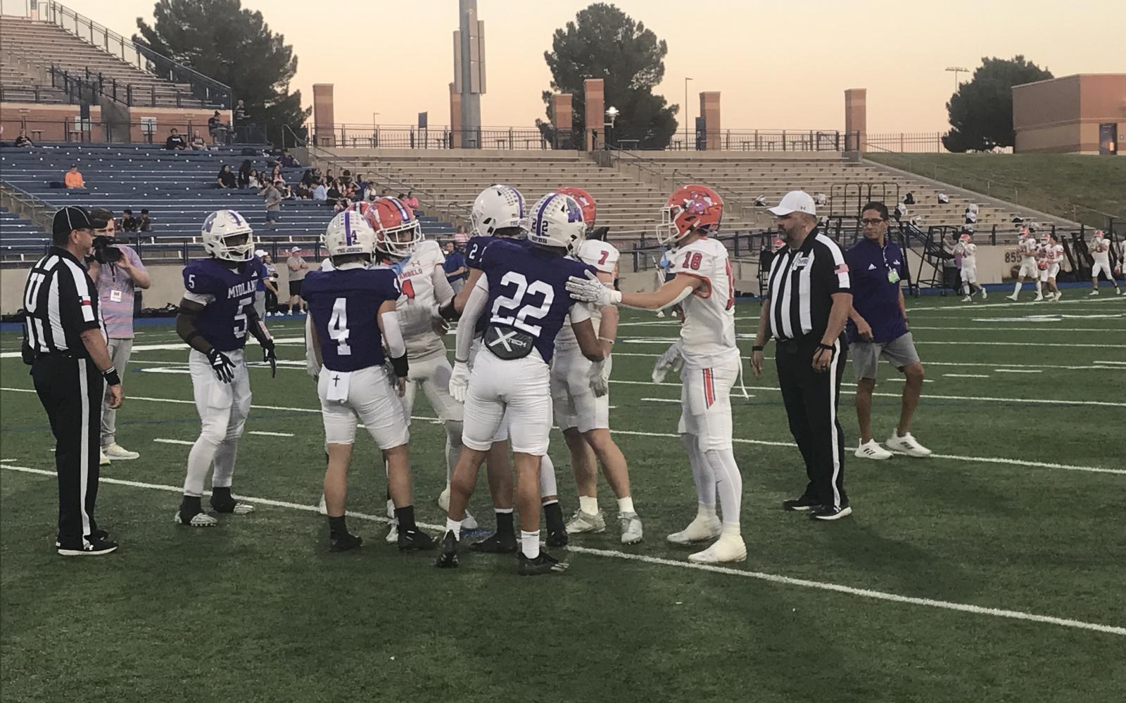 The captains from San Angelo Central and Midland High meet at midfield before their game Friday, Oct. 25, 2024.