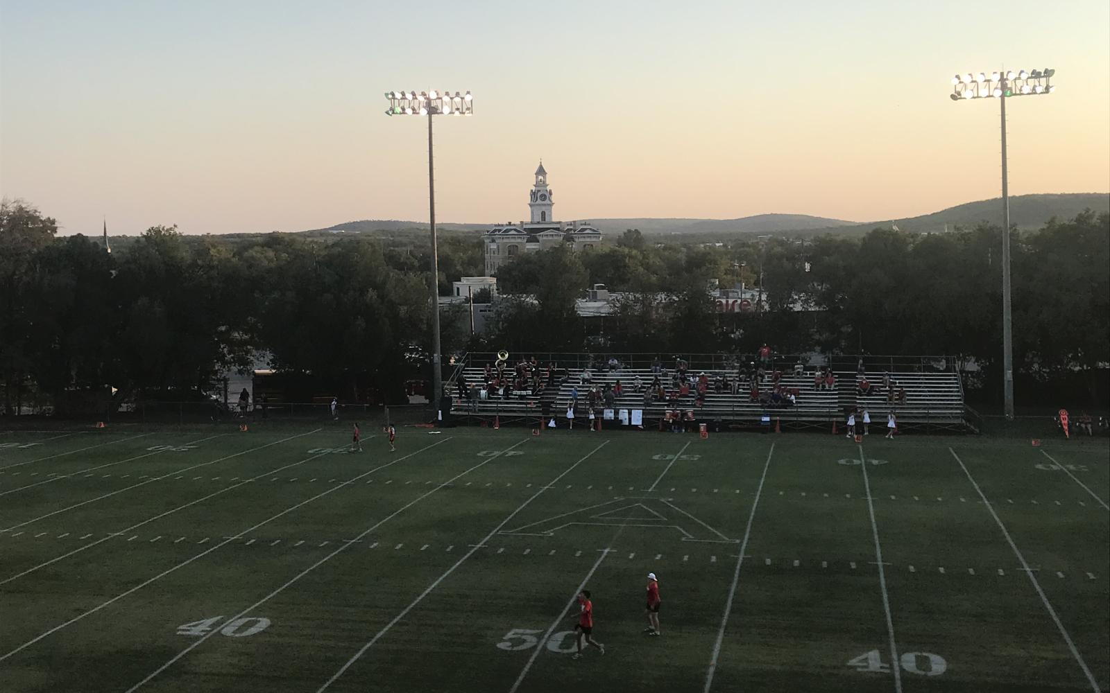 The Shackelford County Courthouse can be seen in the distance from the top of the stands at Albany's Robert Nail Memorial Stadium at Denney Faith Field during the football game between Albany and Miles on Friday, Oct. 11, 2024.