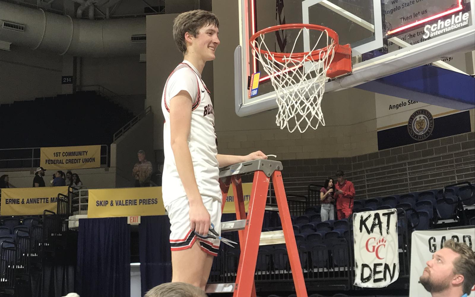 Garden City's Texas Brinkley smiles after cutting down a piece of the net following the Bearkats' 40-38 win over Water Valley on Friday, Feb. 28, 2025.