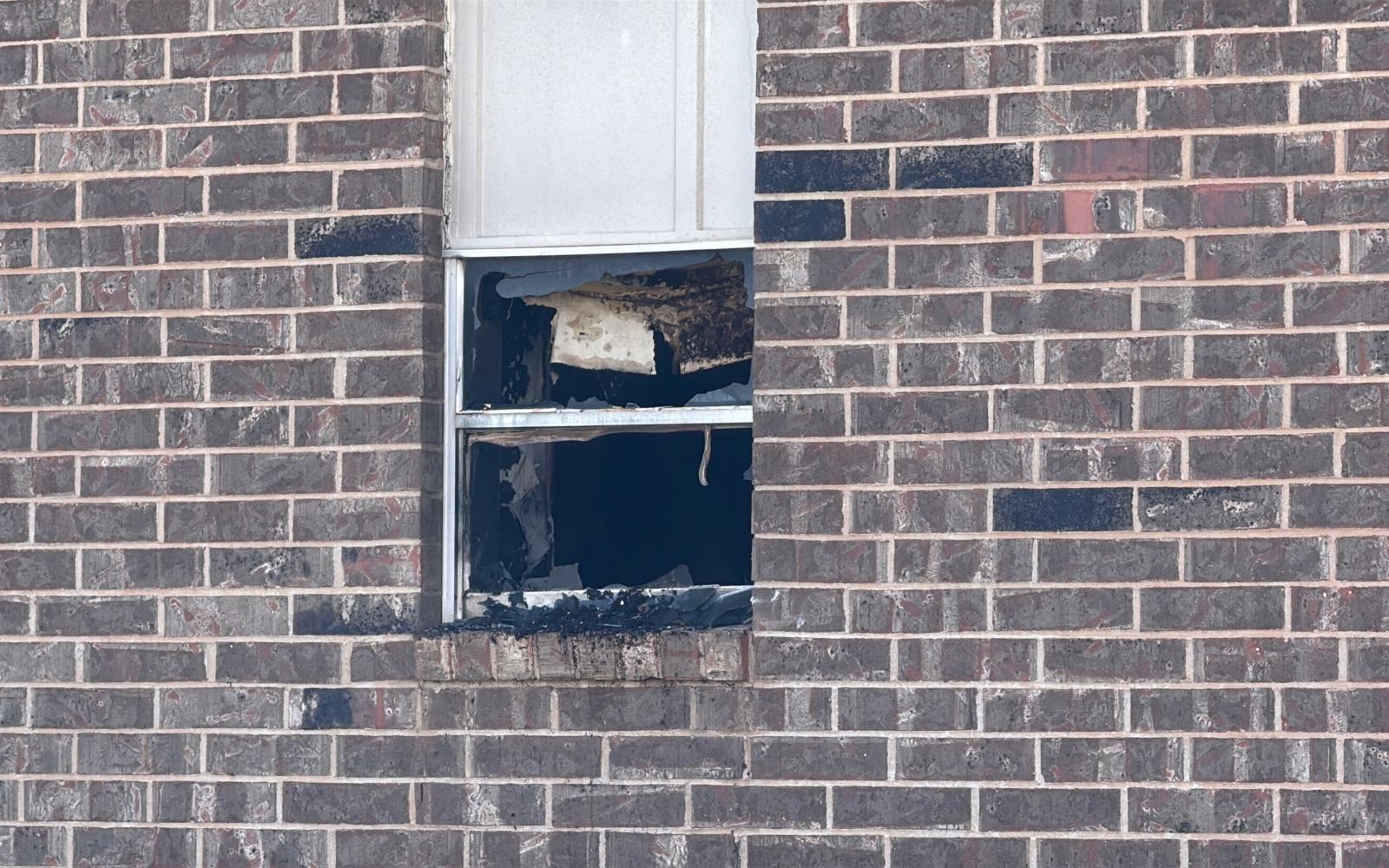 SAN ANGELO, TX — Flames erupted inside and out a window of one unit of the Aura Square Apartments at 3902 Sherwood Way on Wednesday afternoon, prompting a swift response from the San Angelo Fire Department.