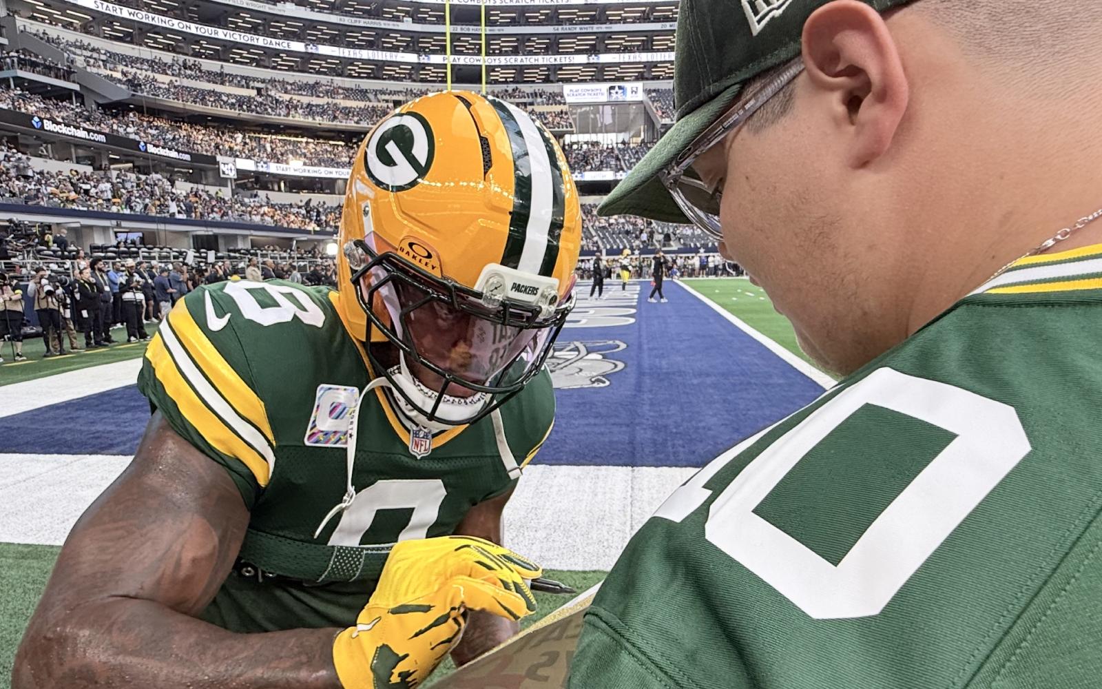 Green Bay Packers Running Back Josh Jacobs and Kian Francis