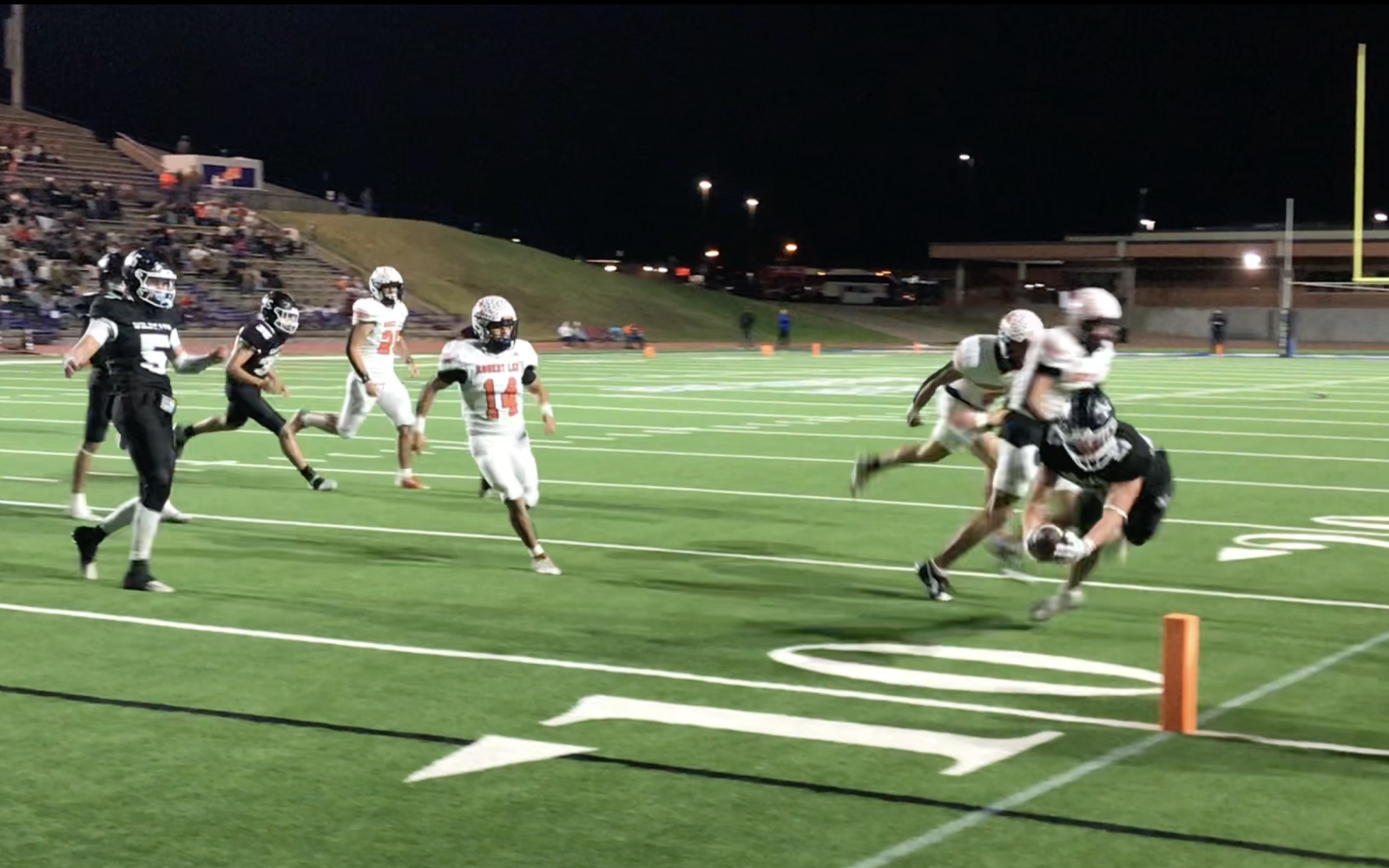 Water Valley's Boston Wiese dives for the pylon to score the game's final touchdown in the Wildcats' 50-28 win over Robert Lee in the state quarterfinals Friday, Nov. 28, 2025.
