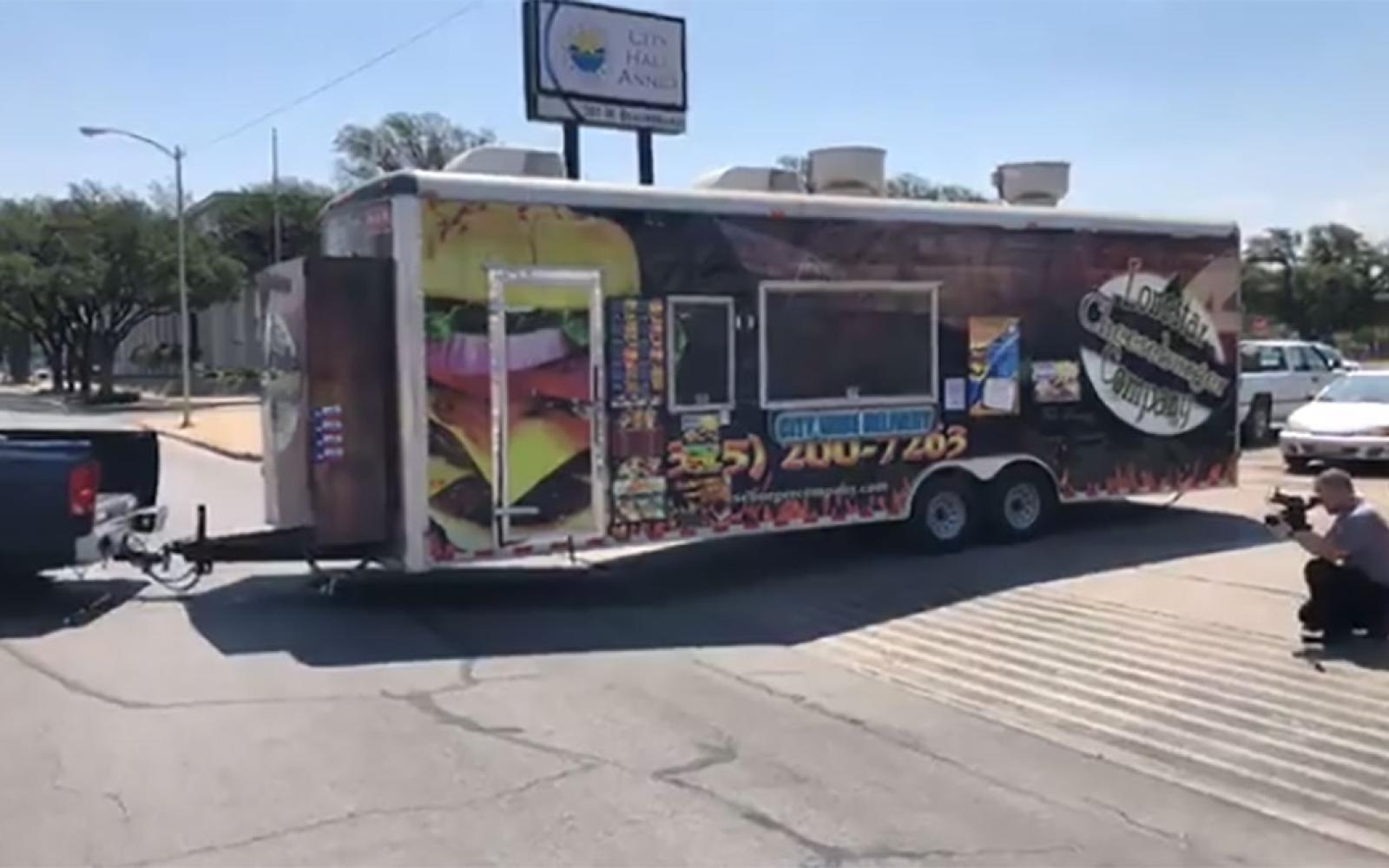The City of San Angelo forced the Lonestar Cheeseburger Co. to prove its trailer was truly mobile by having the proprietor tow the trailer around the block.