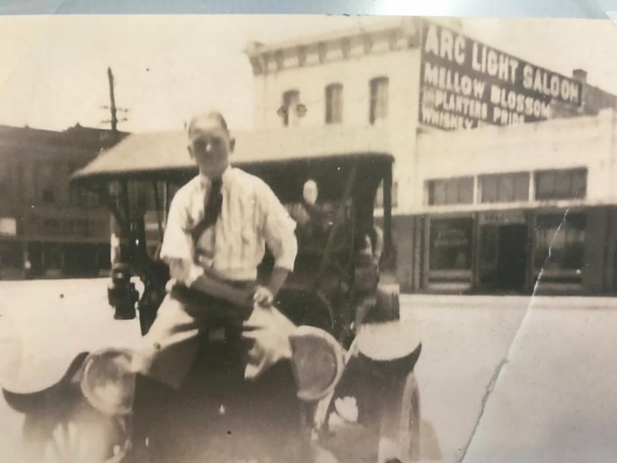 An undated photo. likely from the 1920s, 5 to 10 years after McCloskey's death. Note the painted signage on the side of the Arc Light Saloon. (Heritage Haus)