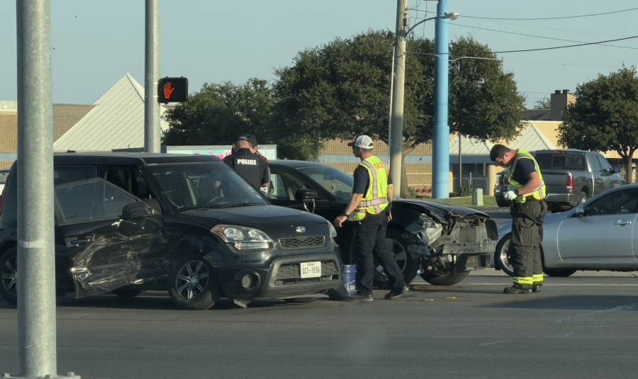 A two vehicle crash at a busy intersection slowed traffic and even pushed it to one lane on either side of Sherwood Way.