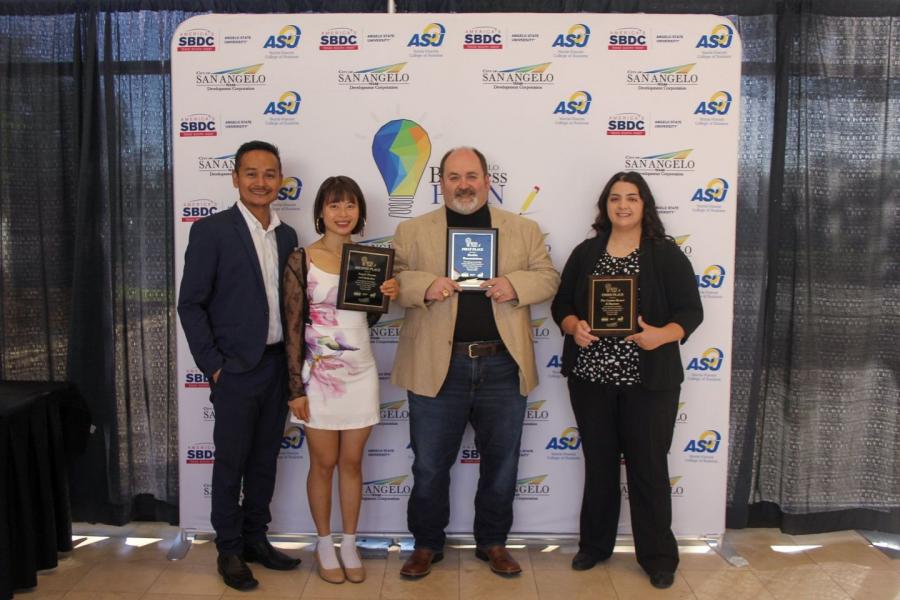 First, second, and third place winners of the 2024 San Angelo Business Plan Competition stand proudly with their awards. From left to right: The owners of Angelo Donuts and Kolaches (2nd place), Rankin Transmissions (1st place), and The Canine Resort &amp; Daycare (3rd place).