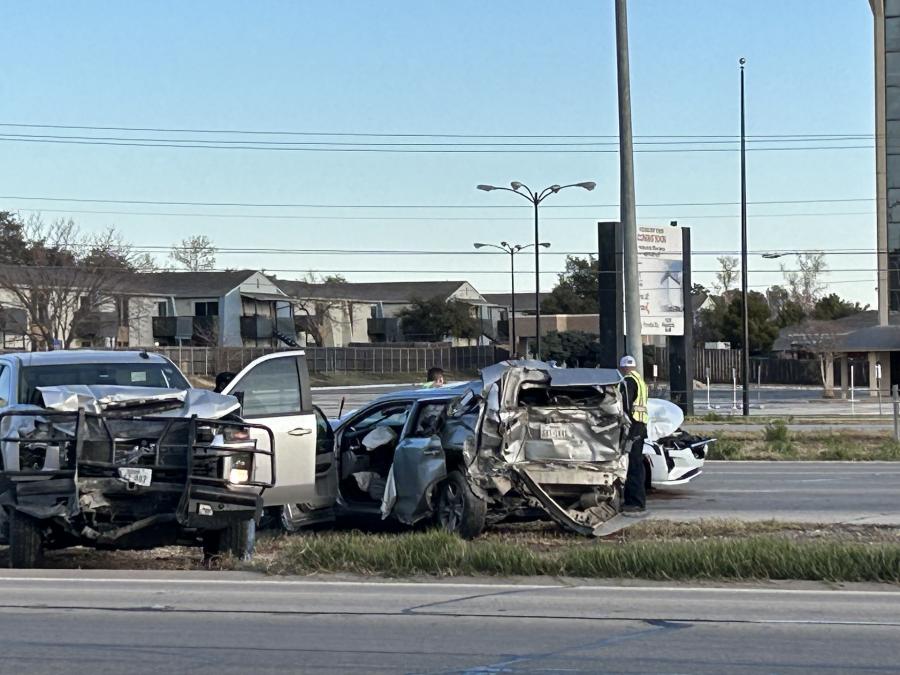 An infant and a woman were hospitalized following a four-vehicle crash Thursday morning on the 2700 block of West Loop 306.