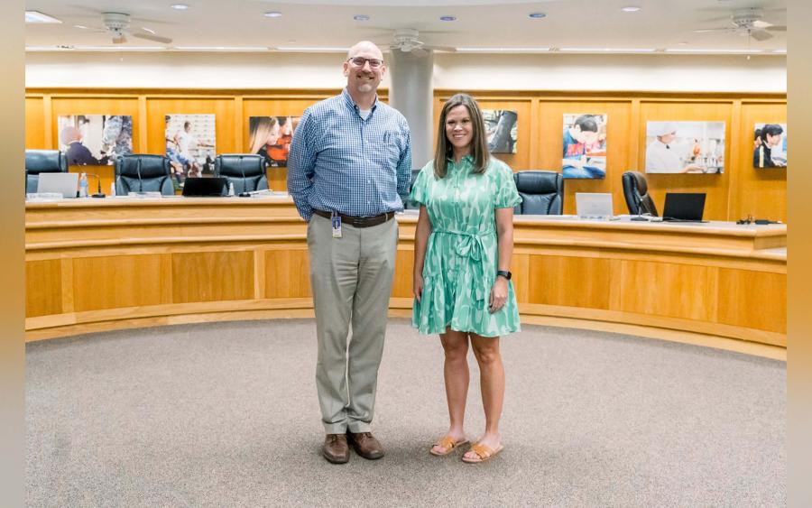 Glenn Middle School teacher Jenny Sanders, named San Angelo ISD’s 2024 Secondary Teacher of the Year, is pictured with Superintendent Dr. Chris Moran after being honored by the board of trustees. (Photo by: San Angelo ISD) 