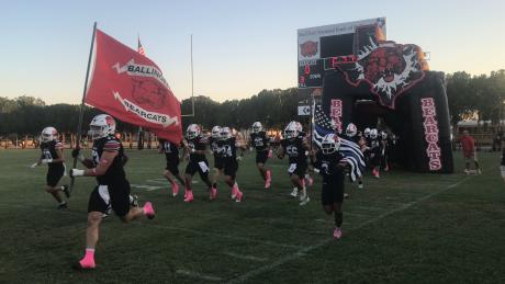 The Ballinger Bearcats run onto the field before their game against Bangs on Friday, Oct. 10, 2025, at Bearcat Stadium.