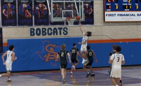 Central's Ean McNeill goes up for 2 points