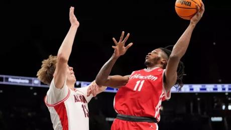 Houston's Joseph Tugler shoots over an Arizona defender during the SEC Tournament Final on March 14, 2026.