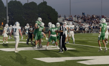 Wall Offensive Lineman Tate Probandt celebrates with Gunner King after he scored a rushing touchdown against Canyon West Plains