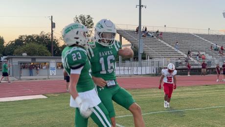 Wall's Sutton Robertson (23) and Nolan Whigham (16) celebrate after a touchdown against La Joya on Thursday, Sept. 3, 2026.
