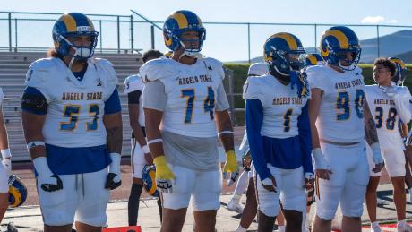 Angelo State players (from left) Viliami Salakielu, Isaiah Mworia, Demetrias Charles and Zach Burton prepare for the Rams' game against Western Colorado on Thursday, Sept. 3, 2026.