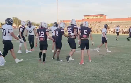 Ballinger's Hunter Kresta celebrates with teammates after a touchdown catch against Brady on Friday, Sept. 18, 2026.