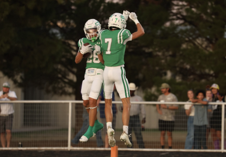Wall's Hudson Surber (28) celebrates a touchdown catch with Braylon Nelson (7) against Ozona on Friday, Sept. 18, 2025.