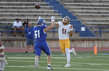 Lake View's Conner Williams pressures Pecos quarterback Avery Garcia on Friday, Sept. 18, 2026.