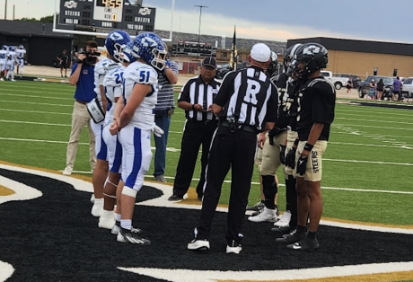 Lake View and Big Spring meet for the coin toss before their game Friday, Sept. 25, 2026.
