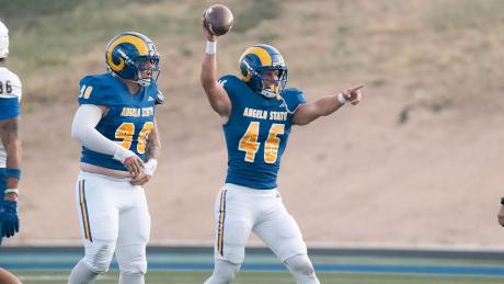 Angelo State's Zach Burton and Caleb Taylor celebrate during the 2026 season.