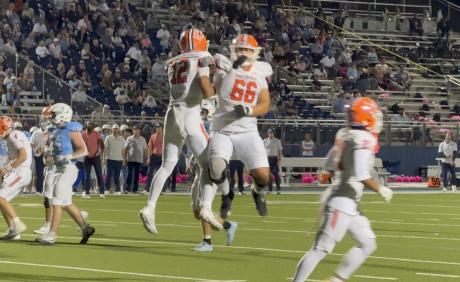 Central Bobcats celebrate a touchdown against Midland Greenwood