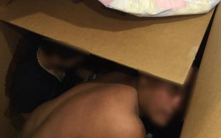 Illegal Aliens Smuggled in Cardboard Boxes.  CBP Image