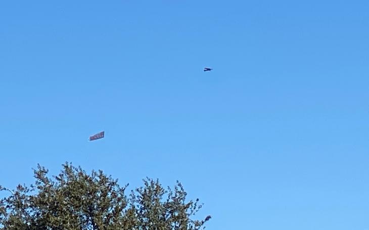 Col. Pfluger Banner Flyover (LIVE! Photo/Yantis Green)