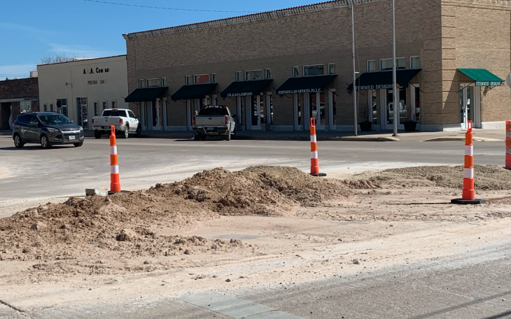 Damaged Road on Twohig and Randolph